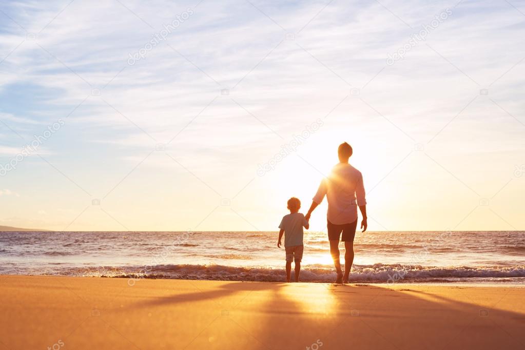 Father and Son Walking Together Holding Hands