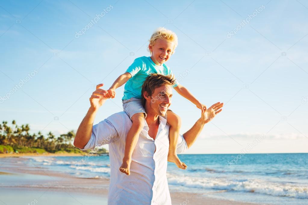 Father and Son Playing at beach