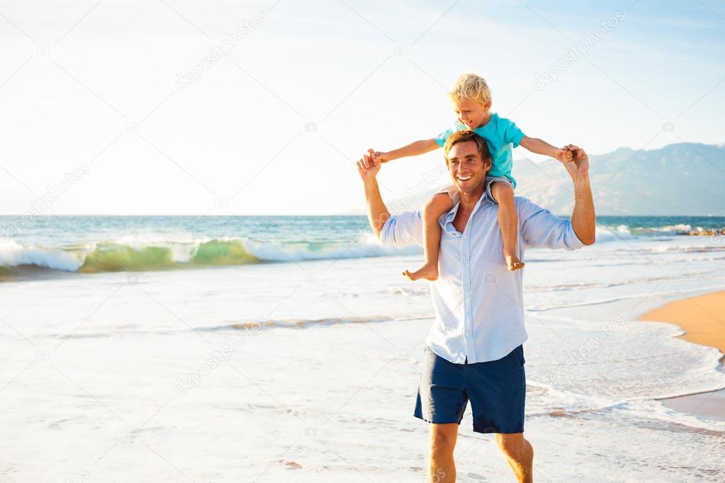 Father and Son Playing at beach