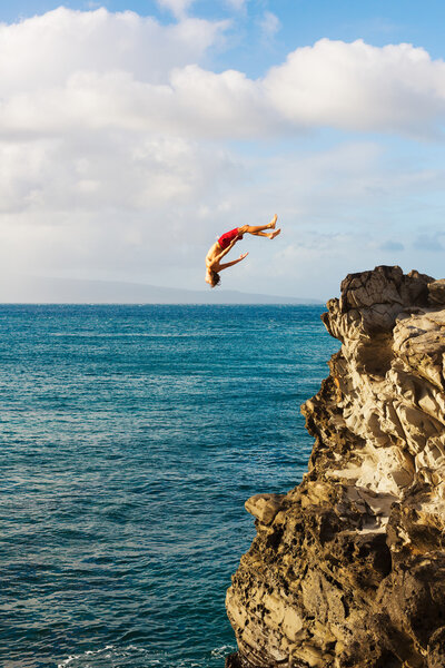 Cliff Jumping extreme at sunset
