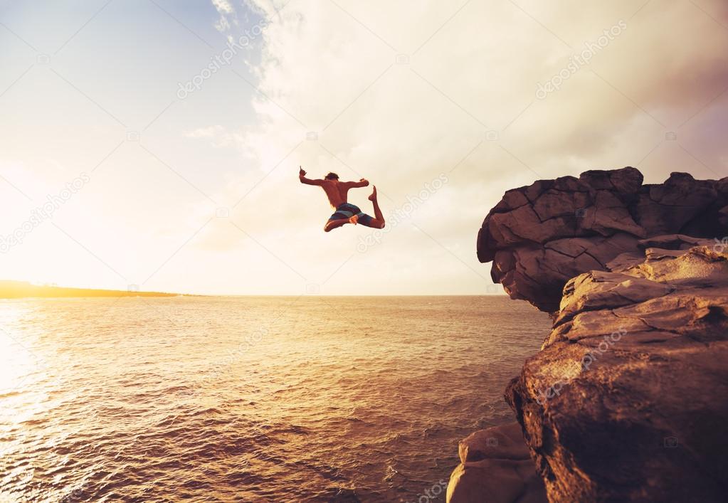 Cliff Jumping extreme at sunset