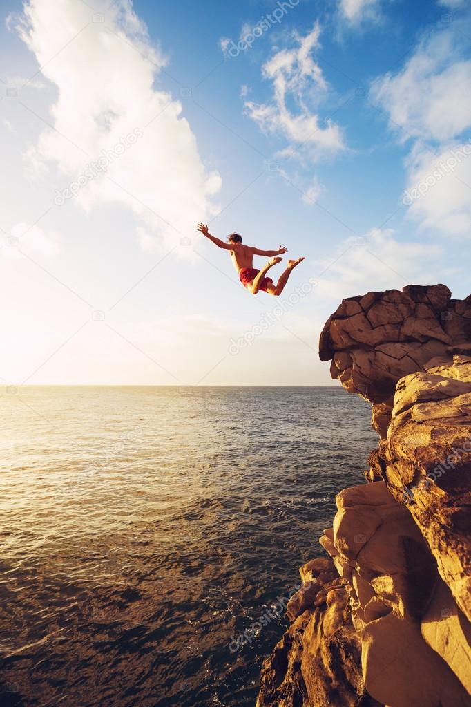 Cliff Jumping extreme at sunset