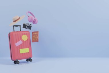 Mavi arka planda izole edilmiş seyyar şeyler. Bavul, kamera, pasaport, kulaklık, plaj şapkası. 