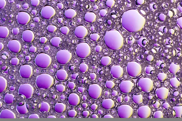 Artistic Colorful oil and soap bubbles in water — Stock Photo, Image