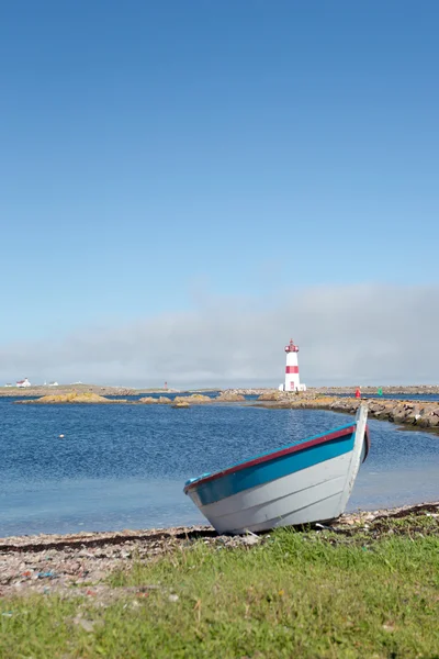 Dory and Lighthouse — Stock Photo, Image