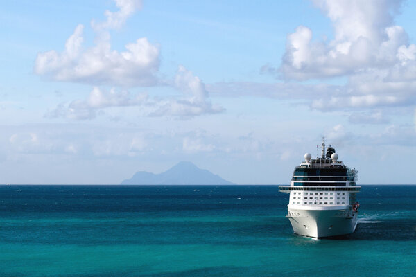 Cruise Ship with Island in Background