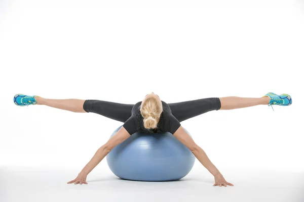 Lepilemur blonde ligt op fitball — Stockfoto