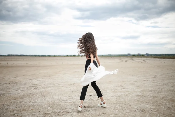 Girl on the sand — Stock Photo, Image