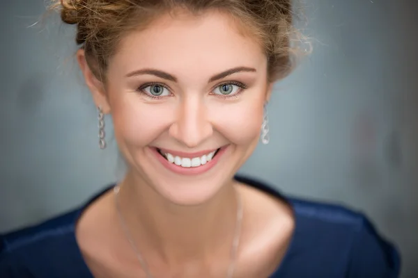 Fair-haired lovely girl with beautiful braided hair. Close portr — Stock Photo, Image