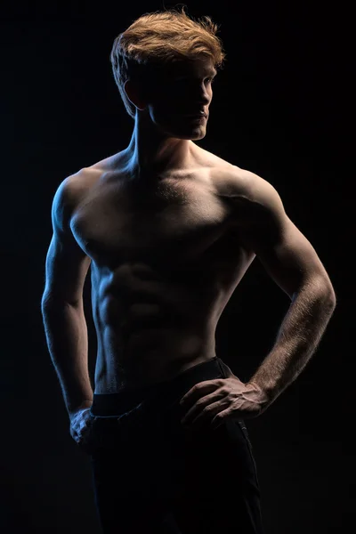 Portrait of handsome red-haired athlete topless at the studio — Stock Photo, Image