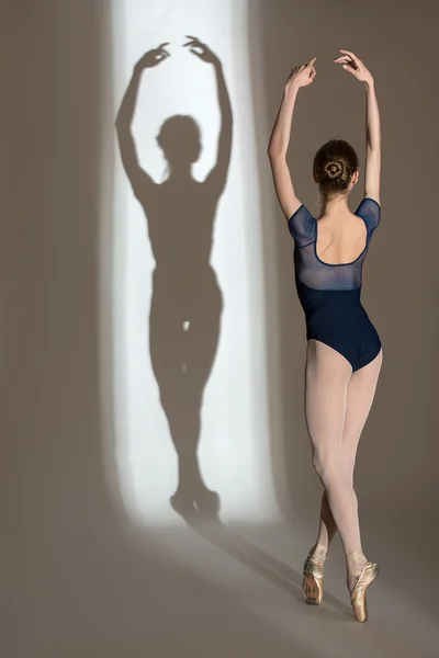 Full growth portrait of the graceful ballerina in a studio — Stock Photo, Image