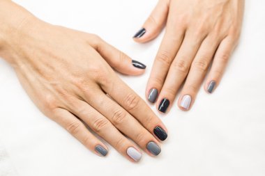 Beautiful manicure on hands of the girl