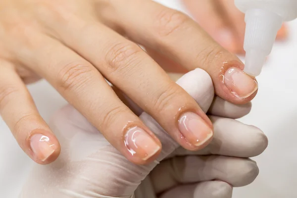 Manicure process in a beauty salon — Stock Photo, Image