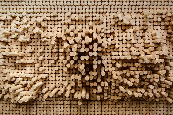 Rows of wooden rounded shanks — Stok fotoğraf