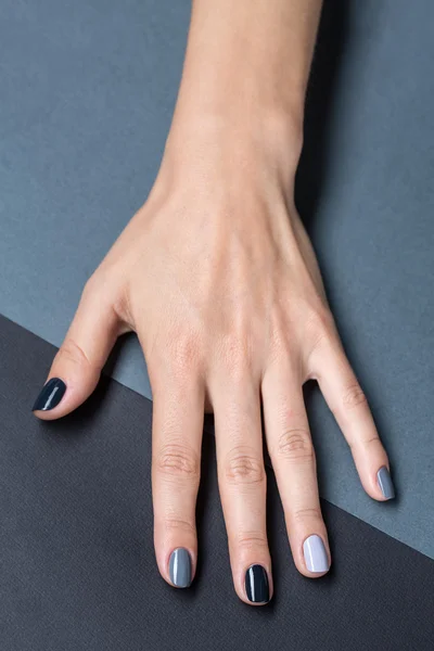 Female hand with a stylish neutral manicure — Stok fotoğraf