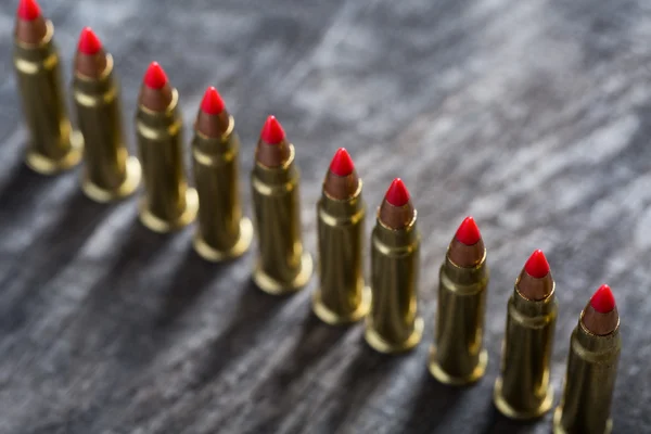 Cartridges ranked with red tip — Stock Photo, Image