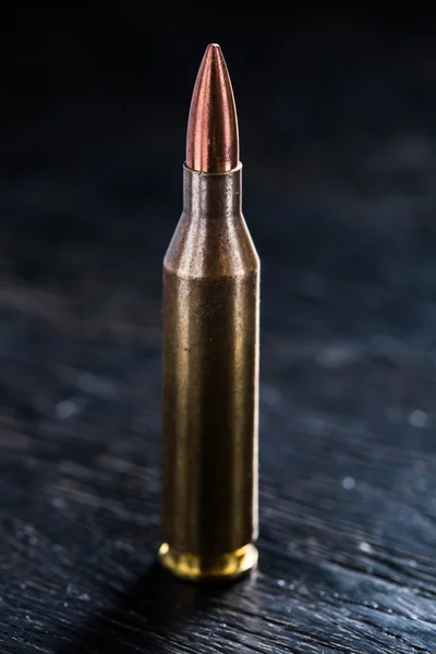 One bullet for a Kalashnikov 7.62mm — Stock Photo, Image