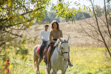 Young couple riding