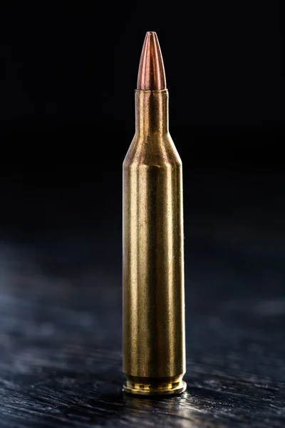 One bullet for a Kalashnikov — Stock Photo, Image