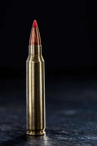 Small-caliber tracer cartridges on a dark background — Stock Photo, Image