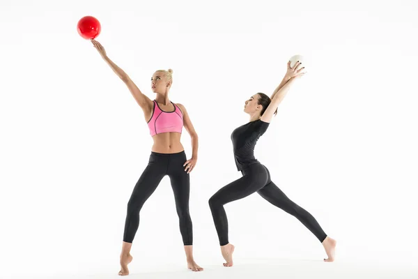 Two girls with balls — Stok fotoğraf