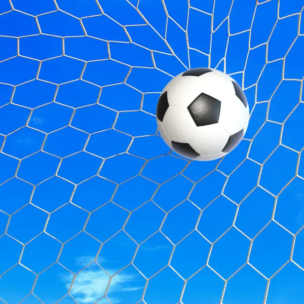 Soccer ball in goal — Stock Photo, Image