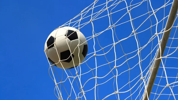 Soccer ball in goal — Stock Photo, Image