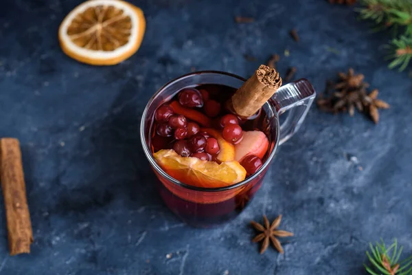 Still life, food and drink, seasonal and holidays concept. Christmas mulled wine on a rustic wooden table. Selective focus, copy space background, top view