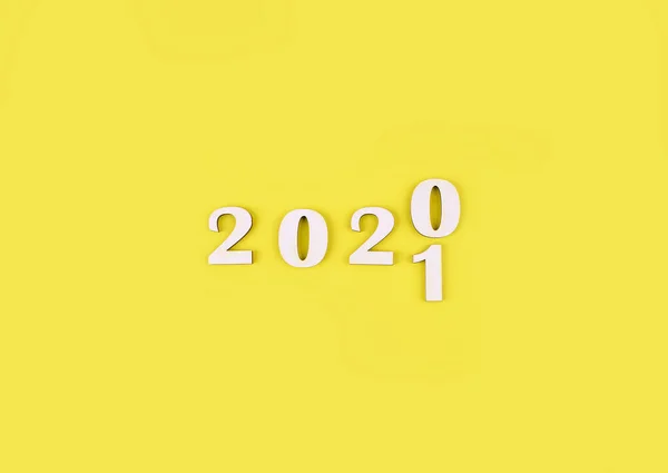 Close Wooden Numbers 2021 Yellow Background Change Year 2020 2021 — Stock Photo, Image