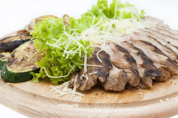 Meat roasted on a grill — Stock Photo, Image