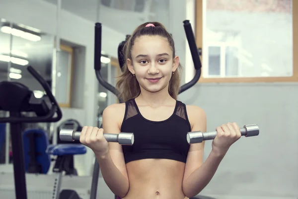 Girl goes in for sports — Stock Photo, Image