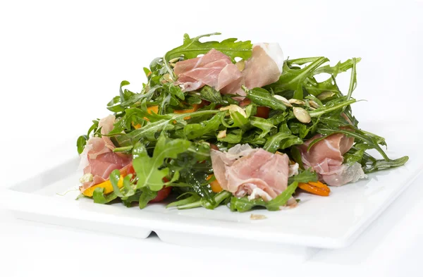 Salad of arugula ham cheese — Stock Photo, Image