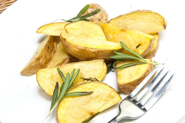 Fried potatoes on a plate — Stock Photo, Image