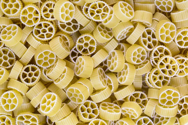 Raw pasta background close up — Stock Photo, Image