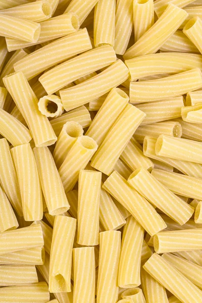 Raw pasta background close up — Stock Photo, Image