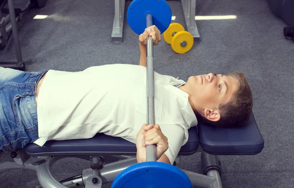 Boy teenager goes in for sports — Stock Photo, Image