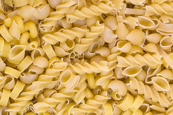 Raw pasta background — Stock Photo, Image