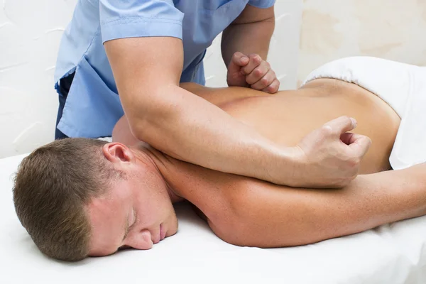 Man doing massage — Stock Photo, Image