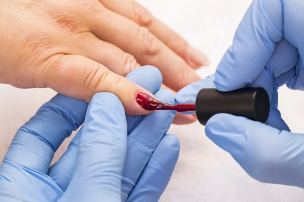 Processes work on a manicure — Stock Photo, Image