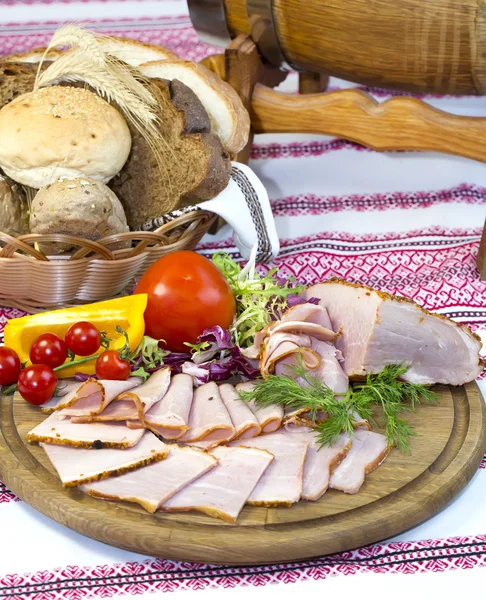 Smoked meat on the table — Stock Photo, Image