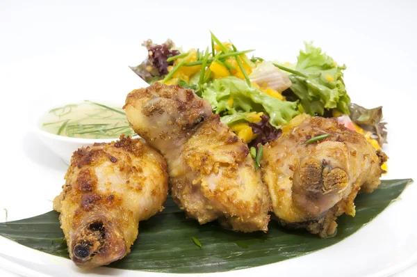 Chicken in curry with salad and sauce — Stock Photo, Image