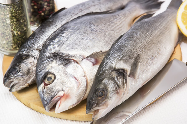 Raw fish on a cutting board