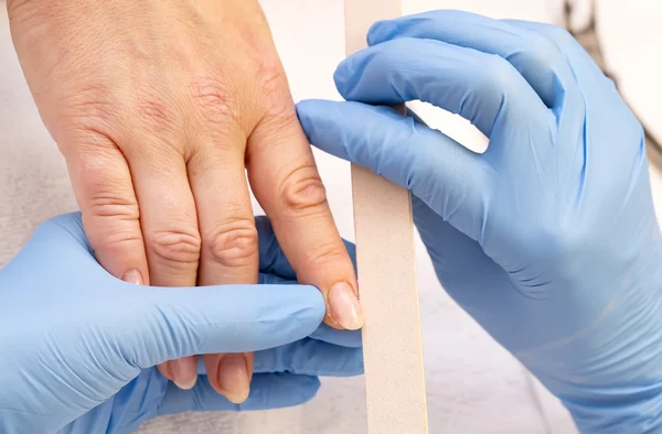 Woman doing manicure — Stock Photo, Image