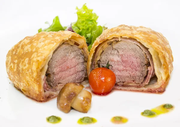 Beef in pastry with salad