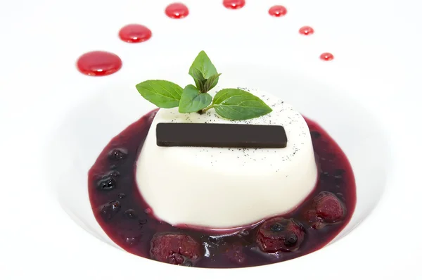 Cream dessert garnished with mint — Stock Photo, Image