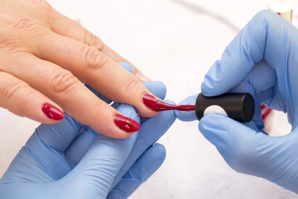 Processes work on a manicure — Stock Photo, Image