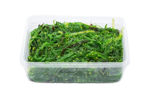 Seaweed salad in a plastic box — Stock Photo, Image