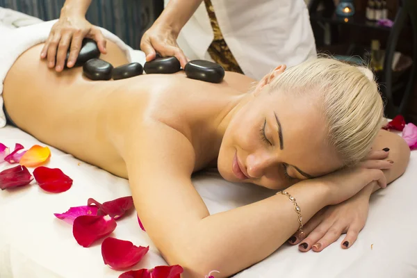 Girl on procedure Balinese massage — Stock Photo, Image