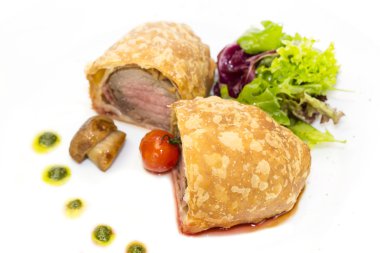 Beef in pastry with salad