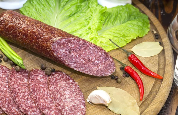 Sausages with vegetables — Stock Photo, Image